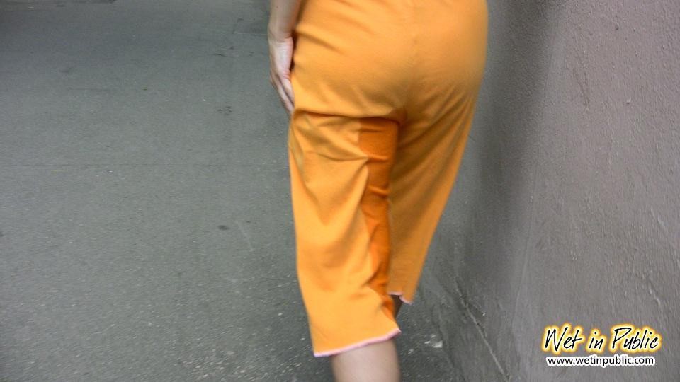 Cute amateur wets her orange breeches on the way home from the beach #73239380