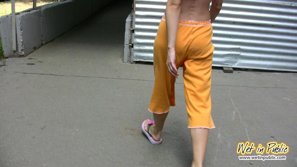 Cute amateur wets her orange breeches on the way home from the beach #73239406