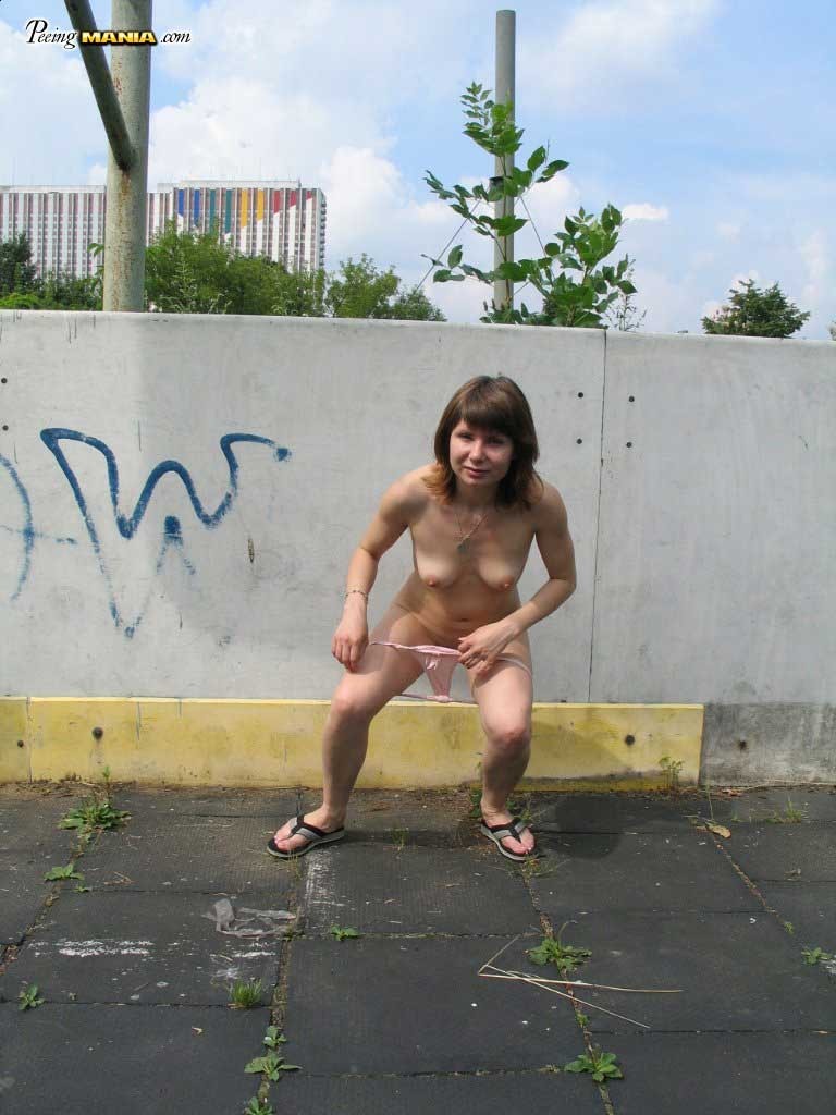 Slut pissing outdoors #76594237