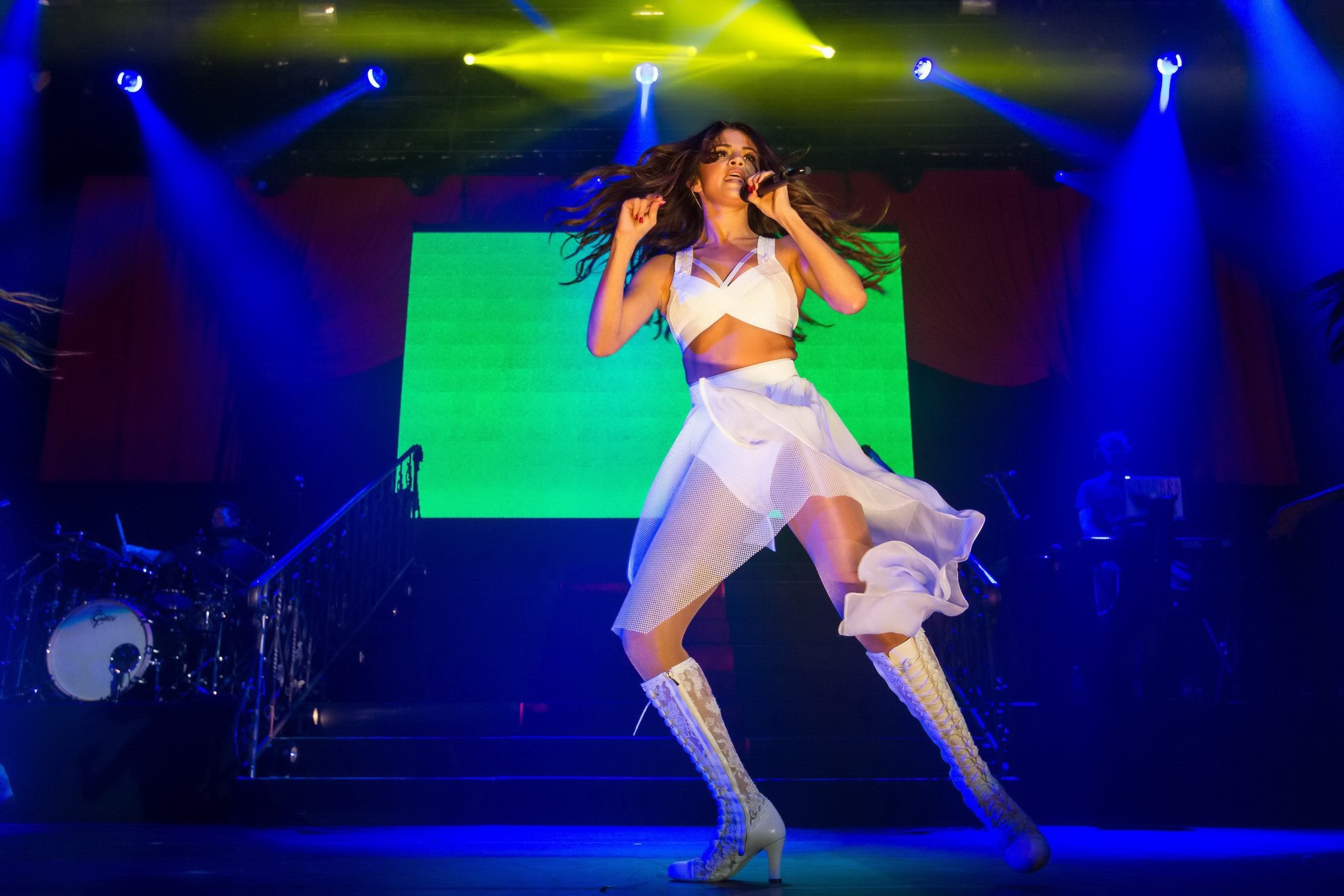 Selena Gomez wearing tiny white belly top and see-through skirt while performs a #75202454