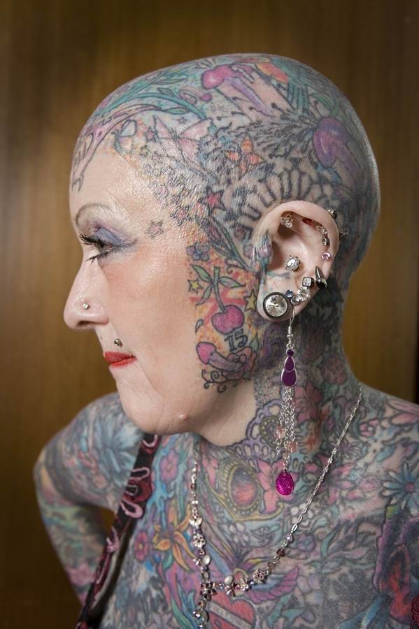 Extreme tattoo and piercing #73235325