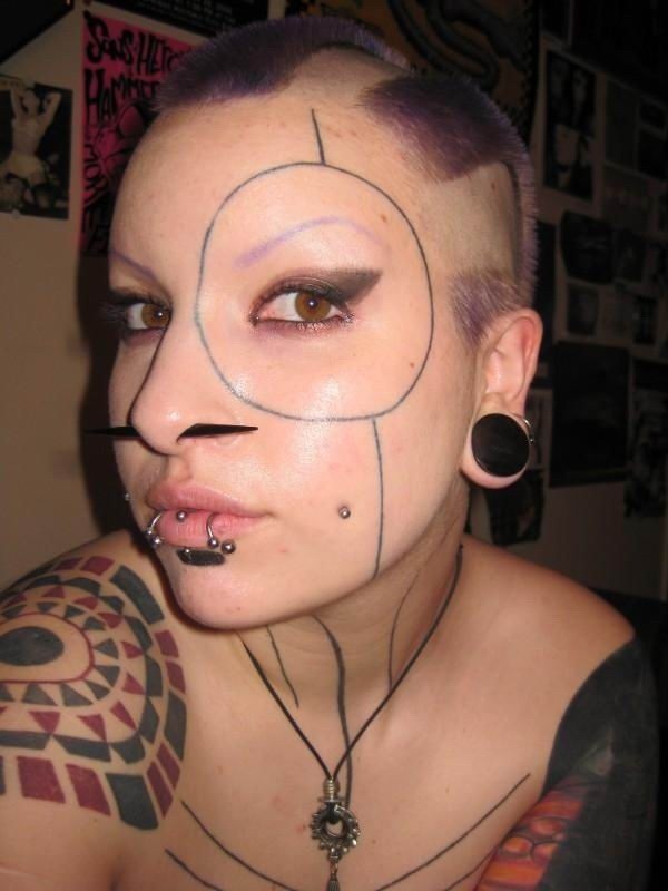 Extreme tattoo and piercing #73235328