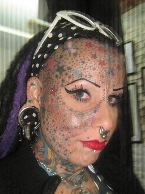 Extreme tattoo and piercing #73235334