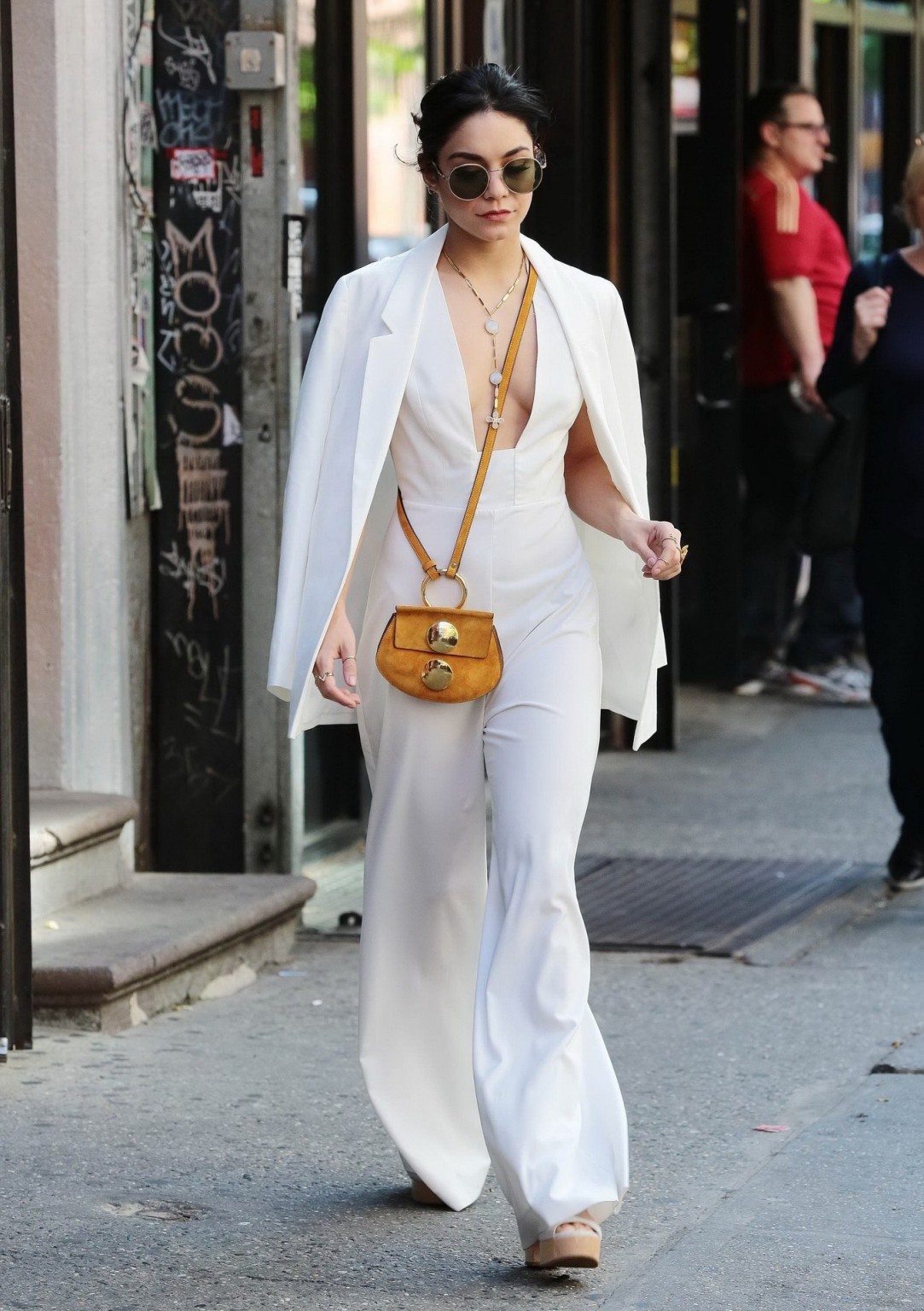Vanessa Hudgens braless in a wide open jumpsuit leaving her apartment in NYC #75163459