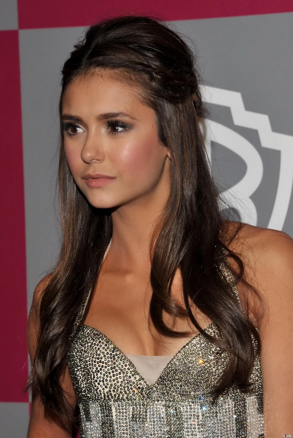 Nina Dobrev shows cleavage wearing strapless mini dress at the InStyle/Warner Br #75320484