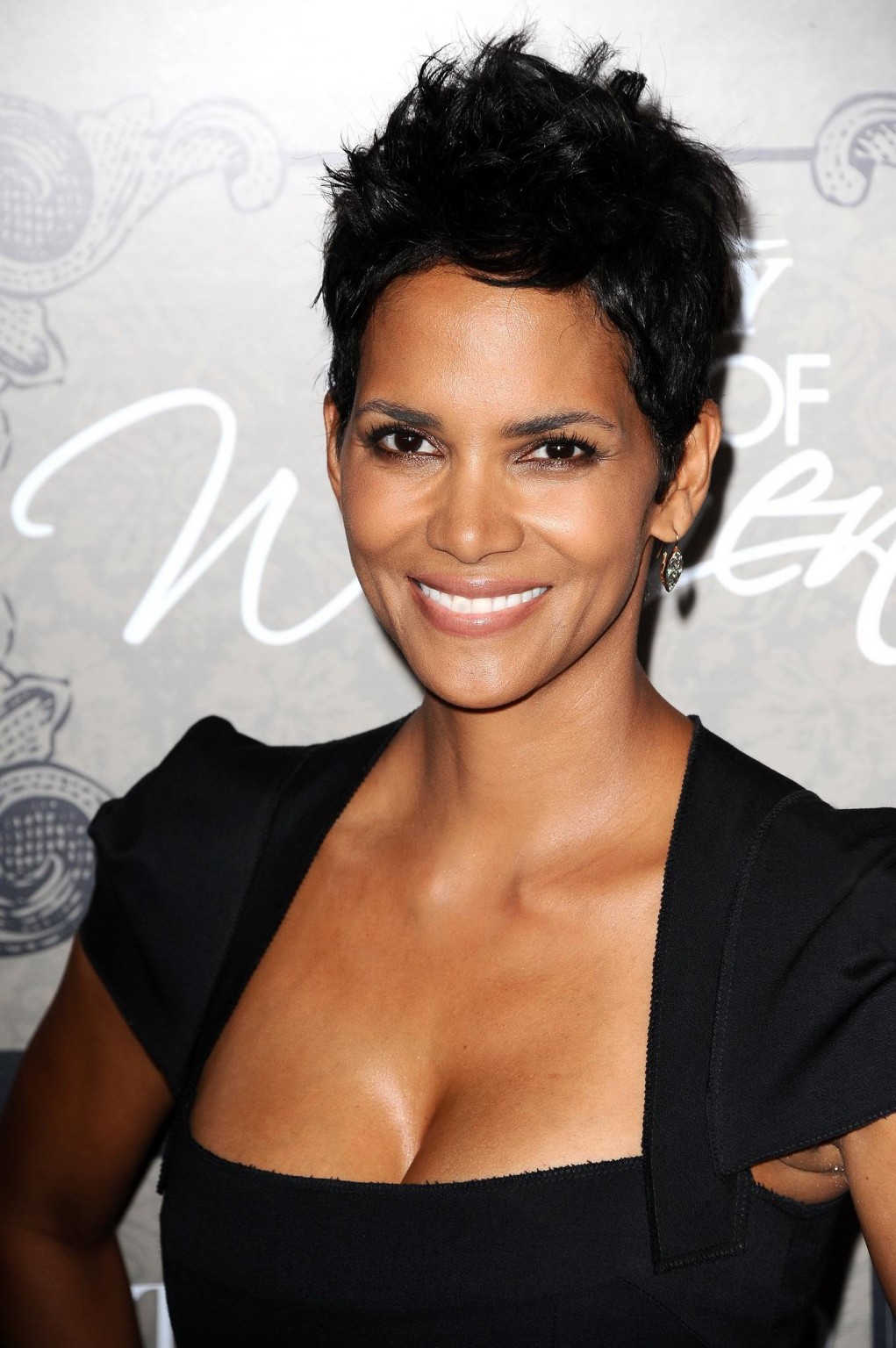 Halle Berry cleavy wearing a black low cut dress at Variety's Power of Women in  #75251165