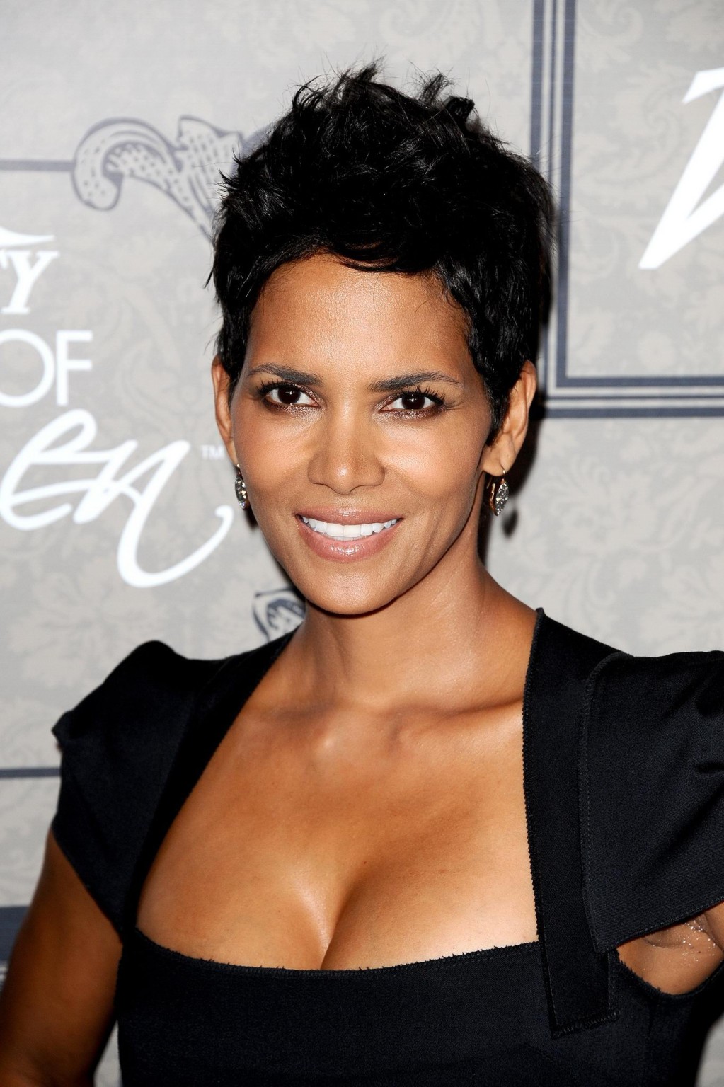 Halle berry cleavy wearing a black low cut dress at variety's power of women in #75251169