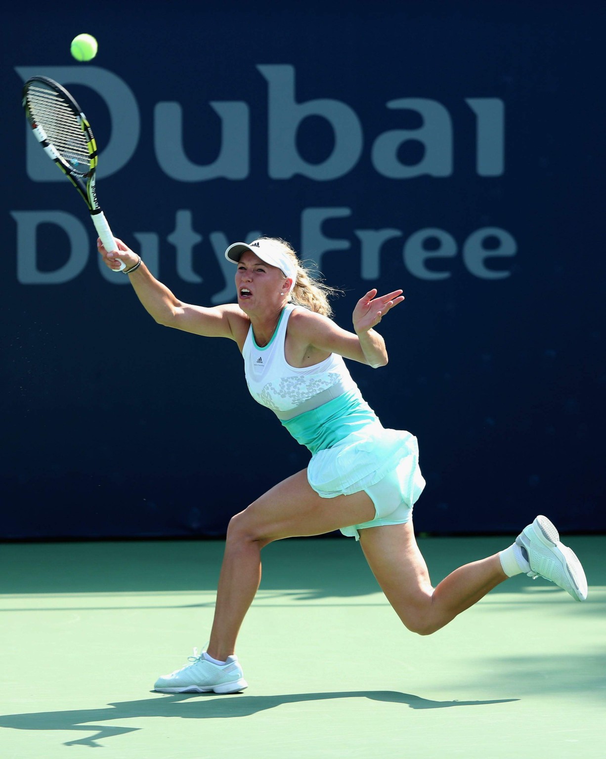 Caroline Wozniacki flashing her white panties at the WTA Dubai Duty Free Tennis  #75203446