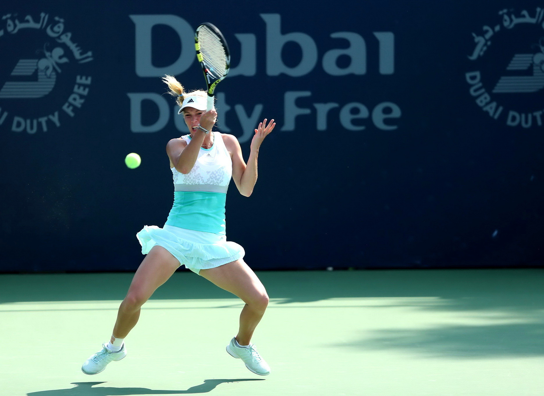 Caroline Wozniacki flashing her white panties at the WTA Dubai Duty Free Tennis  #75203461