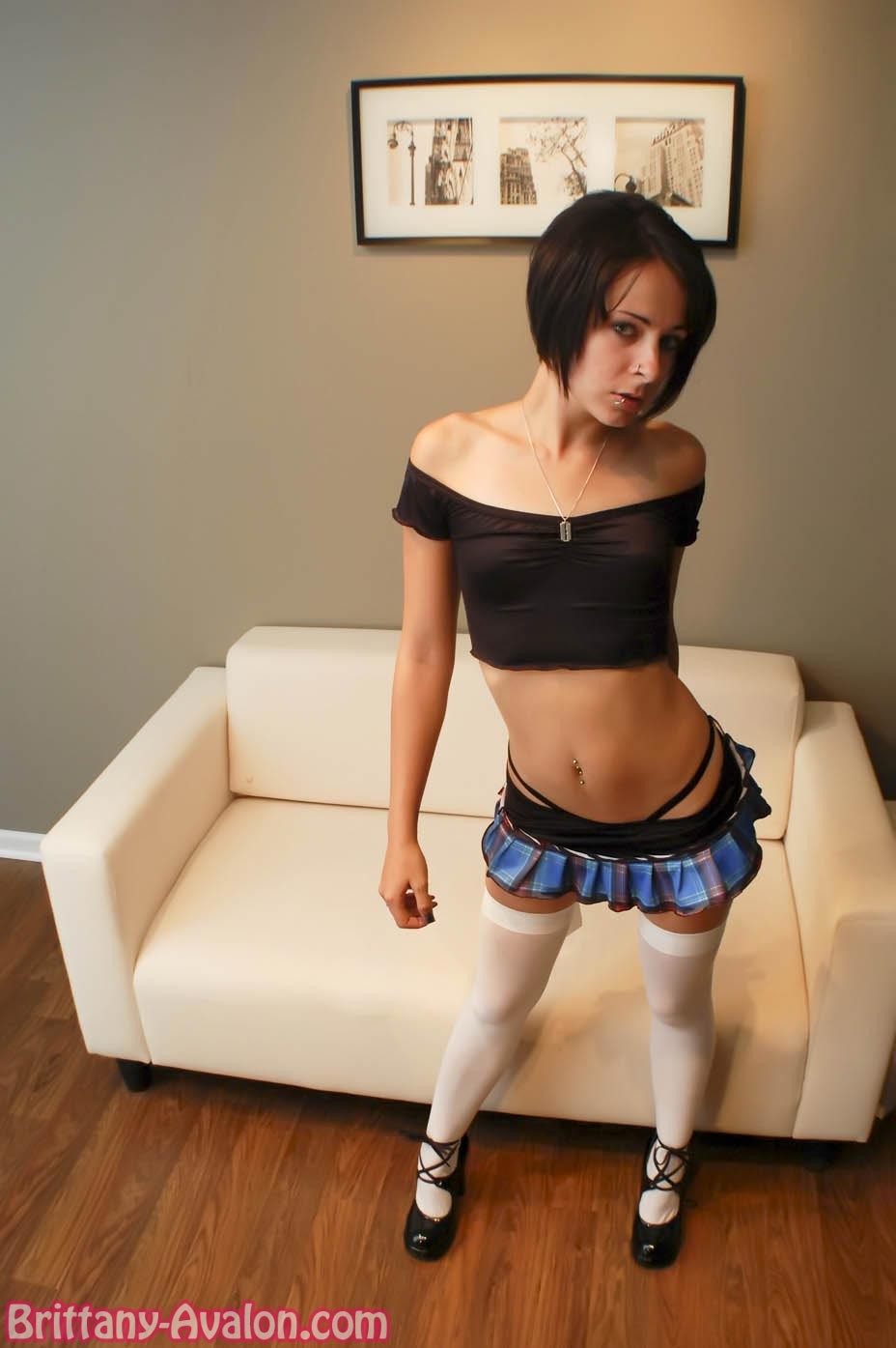 Skinny punk rock teen girl in short skirt