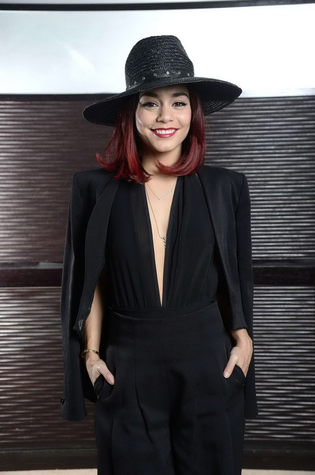 Vanessa Hudgens braless showing big cleavage at the Gimme Shelter photocall in P #75182827