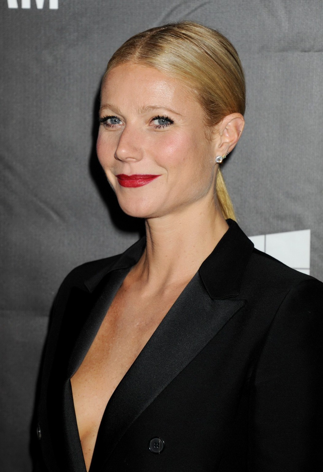 Gwyneth Paltrow braless wearing a wide open jacket at amfAR LA Inspiration Gala  #75182387