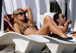Paris Hilton Shows Off Her Hot Body Wearing Tiny Striped Bikini At The Beach In 