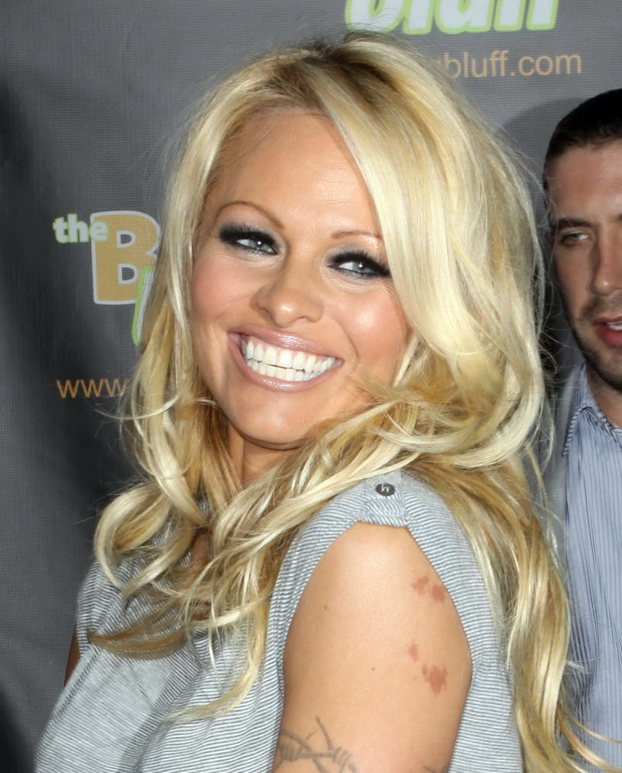 Pamela Anderson leggy in mini dress at 'The Big Bluff' online game launch #75348112
