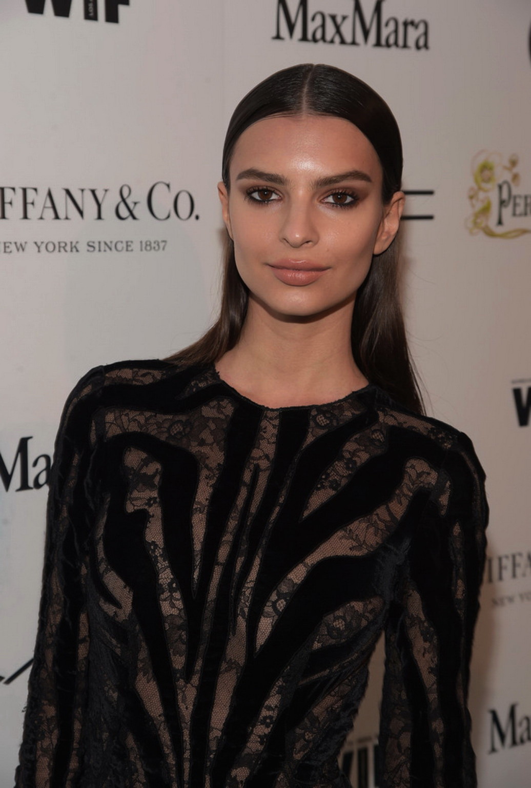 Emily Ratajkowski braless wearing black see through dress at 2015 Tom Ford Colle #75172027