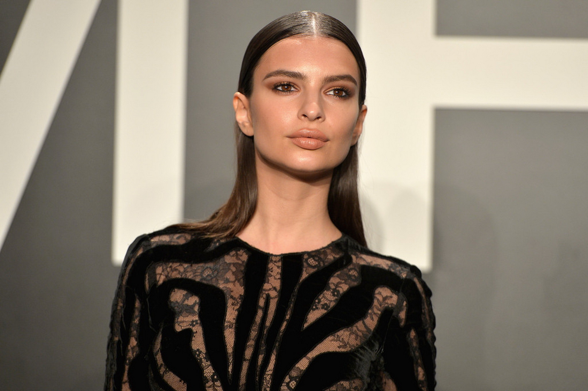 Emily Ratajkowski braless wearing black see through dress at 2015 Tom Ford Colle #75172076