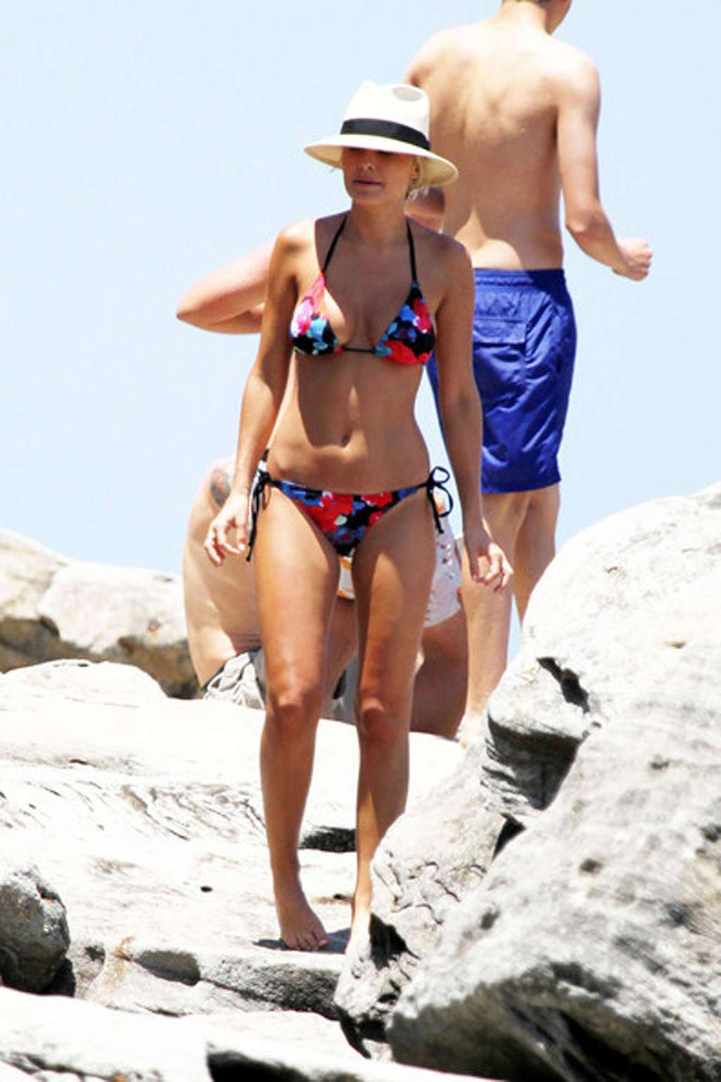 Aussie celeb Lara Bingle topless and bikini candid photographs #73156501
