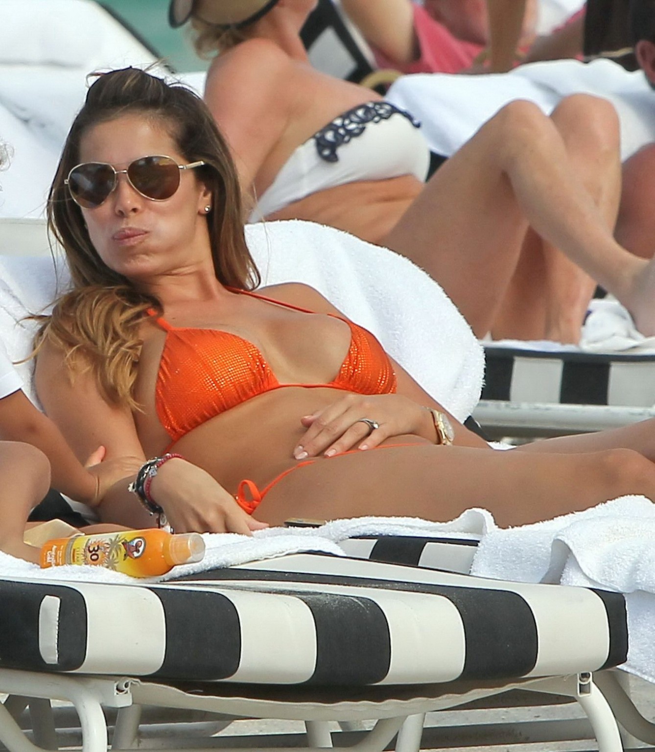 Aida Yespica busty wearing orange bikini on a beach in Miami #75278841