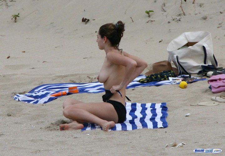 Kelly Brook showing her nice tits on beach paparazzi pictures #75416375