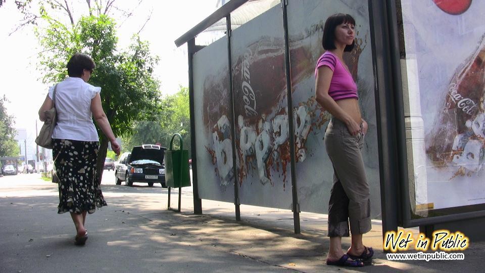 Cute chick finds no better place to wet her pants than this bus stop #73239424