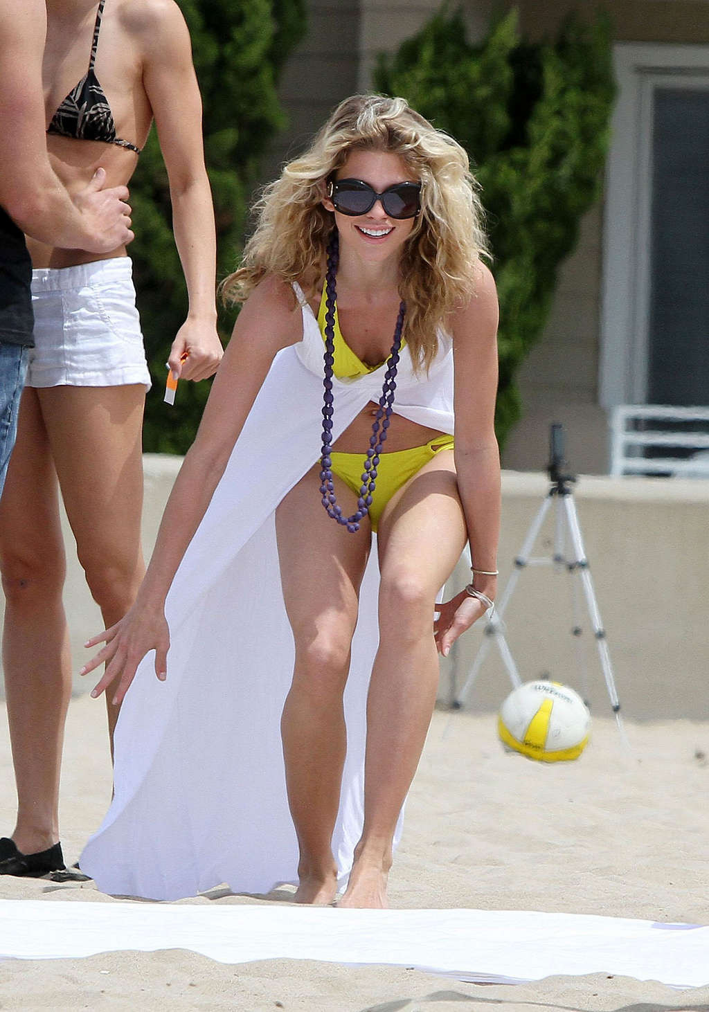 AnnaLynne McCord showing her fantastic body in yellow bikini #75353089