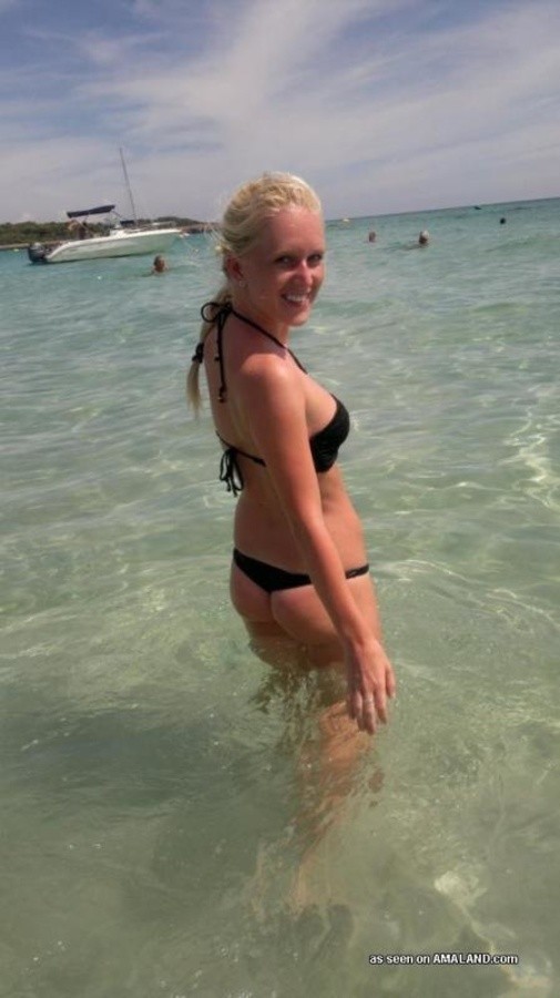 Photos of a sexy blonde babe posing in her black bikini #67571668