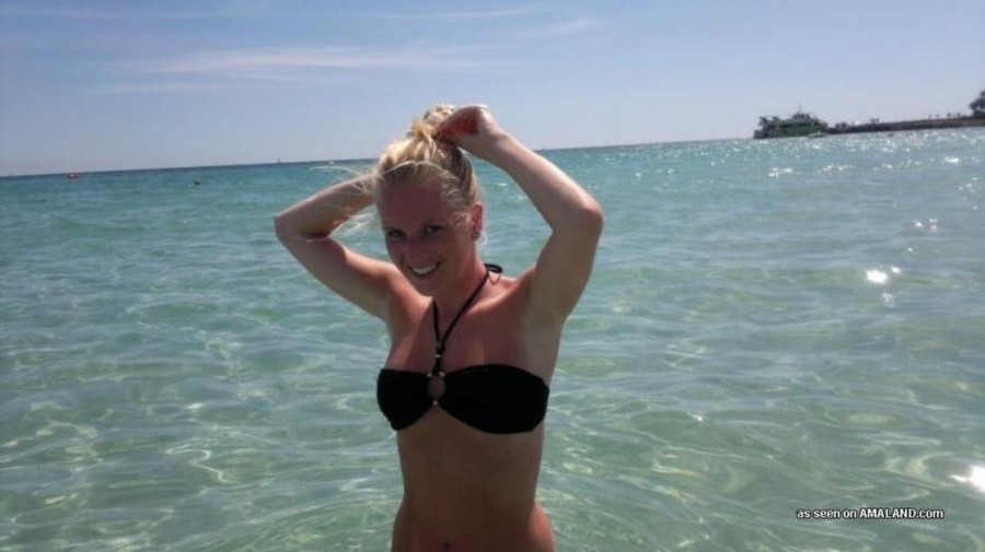 Photos of a sexy blonde babe posing in her black bikini #67571730