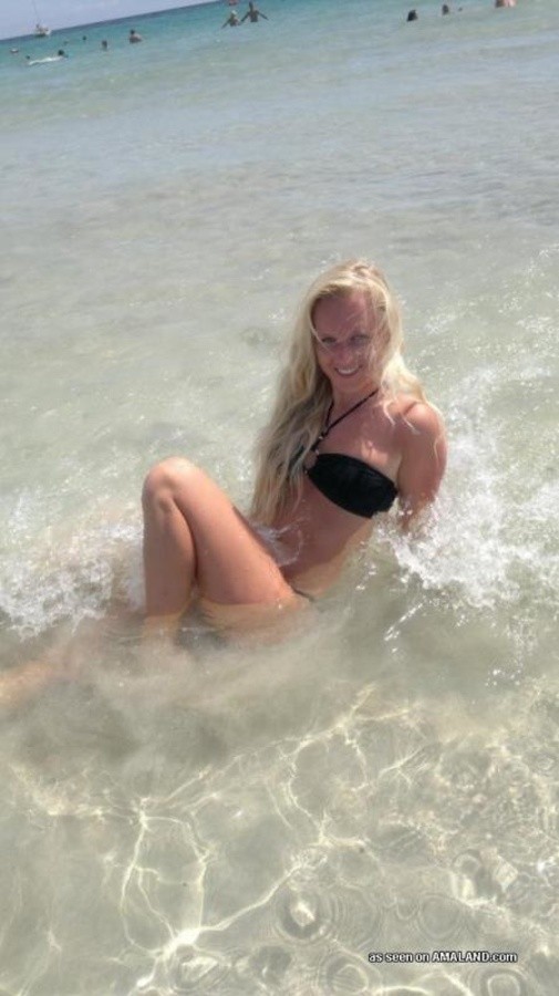 Photos of a sexy blonde babe posing in her black bikini #67571738