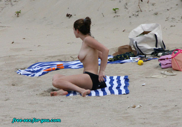 Kelly Brook showing her nice tits on beach paparazzi pictures #75425697