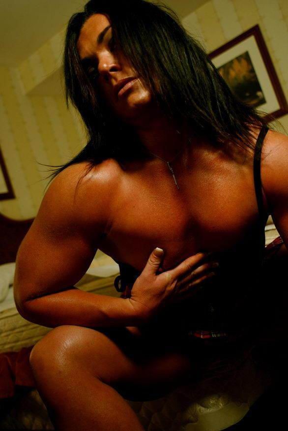 female bodybuilder shows off her muscles #74664597