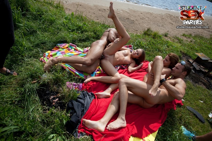 Group hardcore action on the beach #68132285