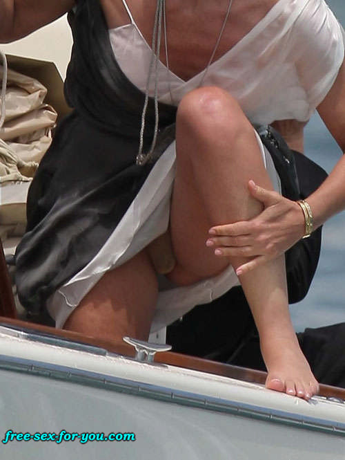Sharon Stone showing her shaved pussy and big tits to paparazzi #75418986