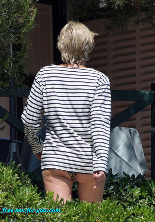 Sharon Stone showing her shaved pussy and big tits to paparazzi #75418992