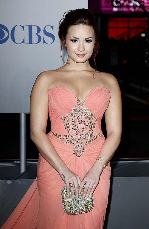 Demi Lovato posing in sexy evening dress and showing huge boobs #75276434