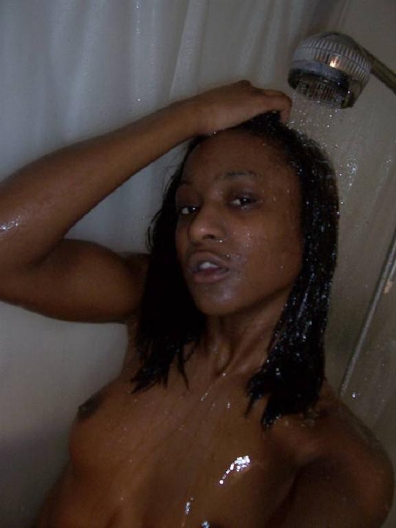 Black chick selfshoots in shower #73374168
