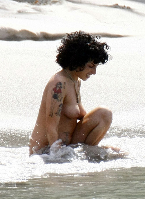 Amy Winehouse showing her nice big tits on beach #75406946