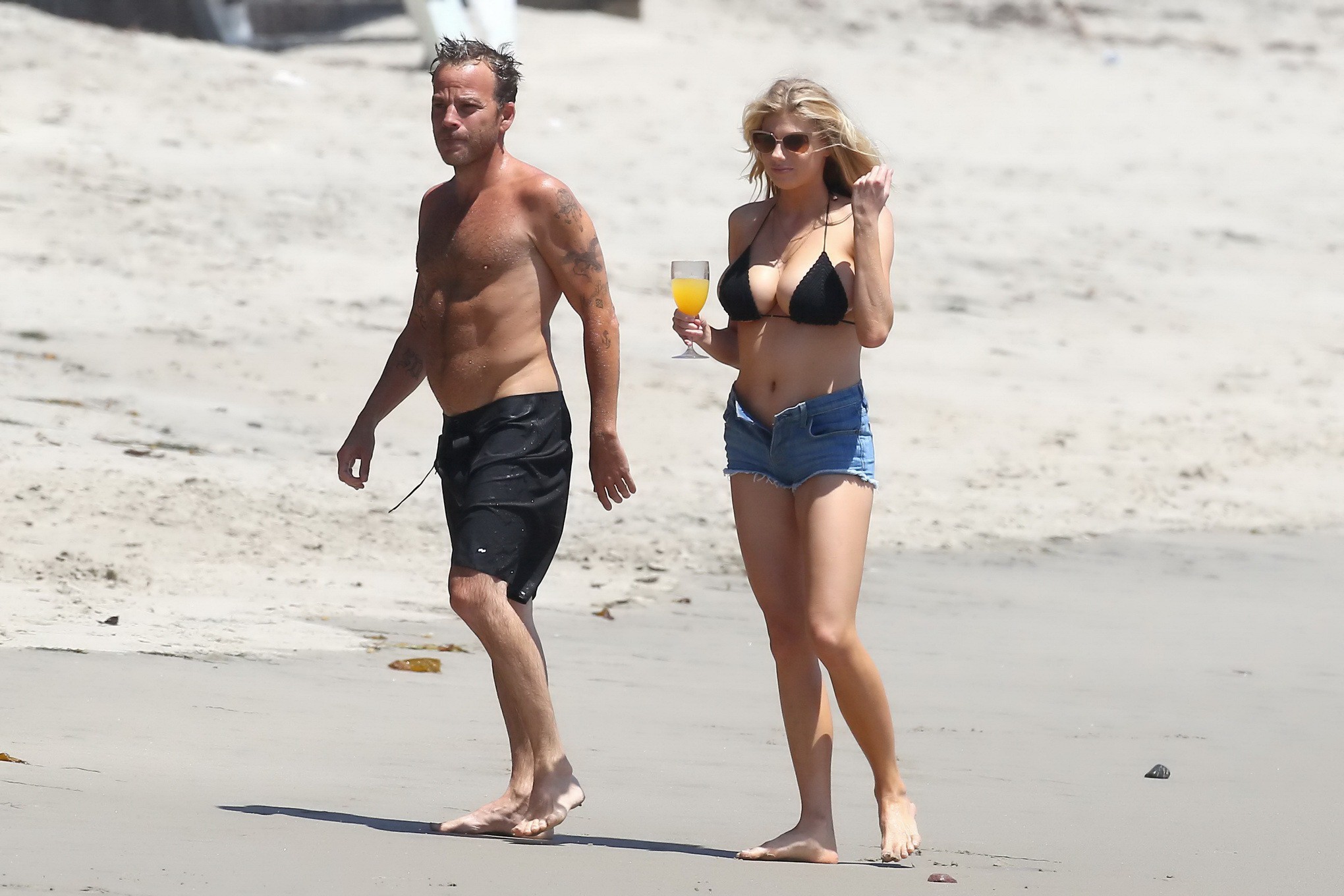 Charlotte McKinney showing melons in bikini top and shorts #75155345