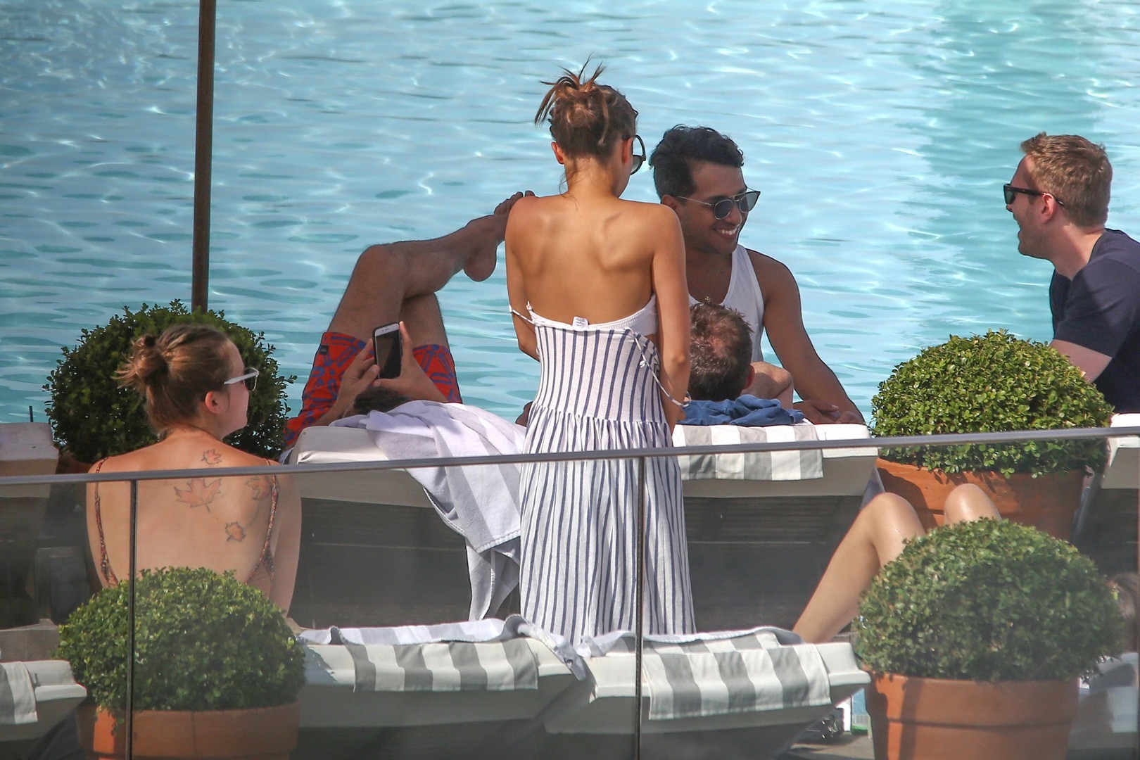 Alicia Vikander stripping to tiny white bikini poolside #75141680