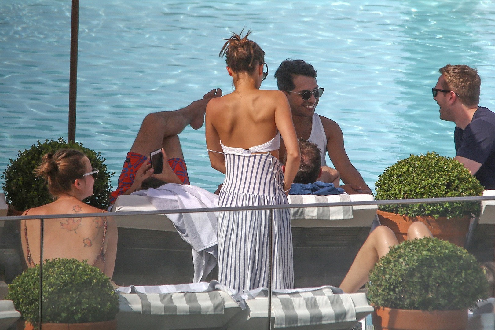 Alicia Vikander stripping to tiny white bikini poolside #75141685