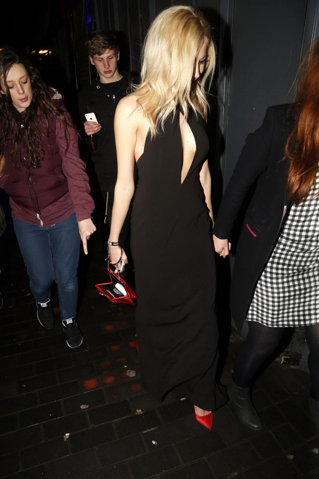 Pixie Lott braless shows cleavage leaving the Universal BRITs 2014 After-Party i #75203176