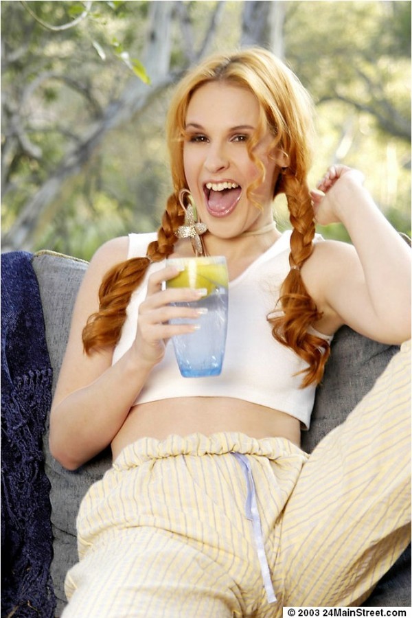 Beautiful redhead Chrissy Daniels could wear a suit of armor and be sexy. #71039659