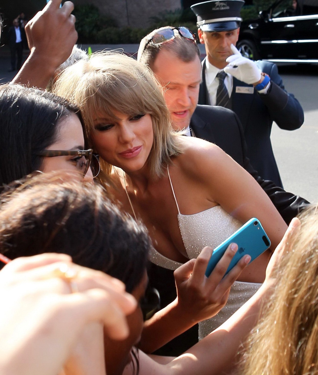 Taylor Swift shows off her ass and huge cleavage wearing a white jumpsuit at the #75163808