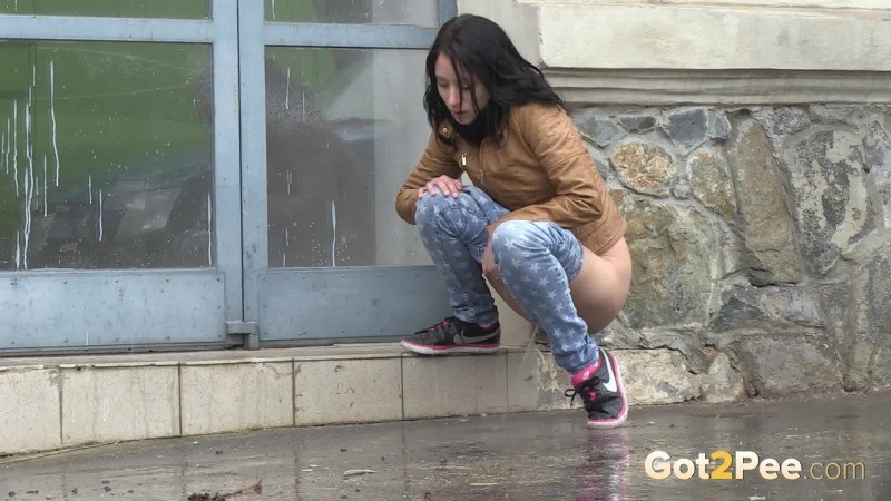 Gorgeous dark haired girl pees in public #67485592