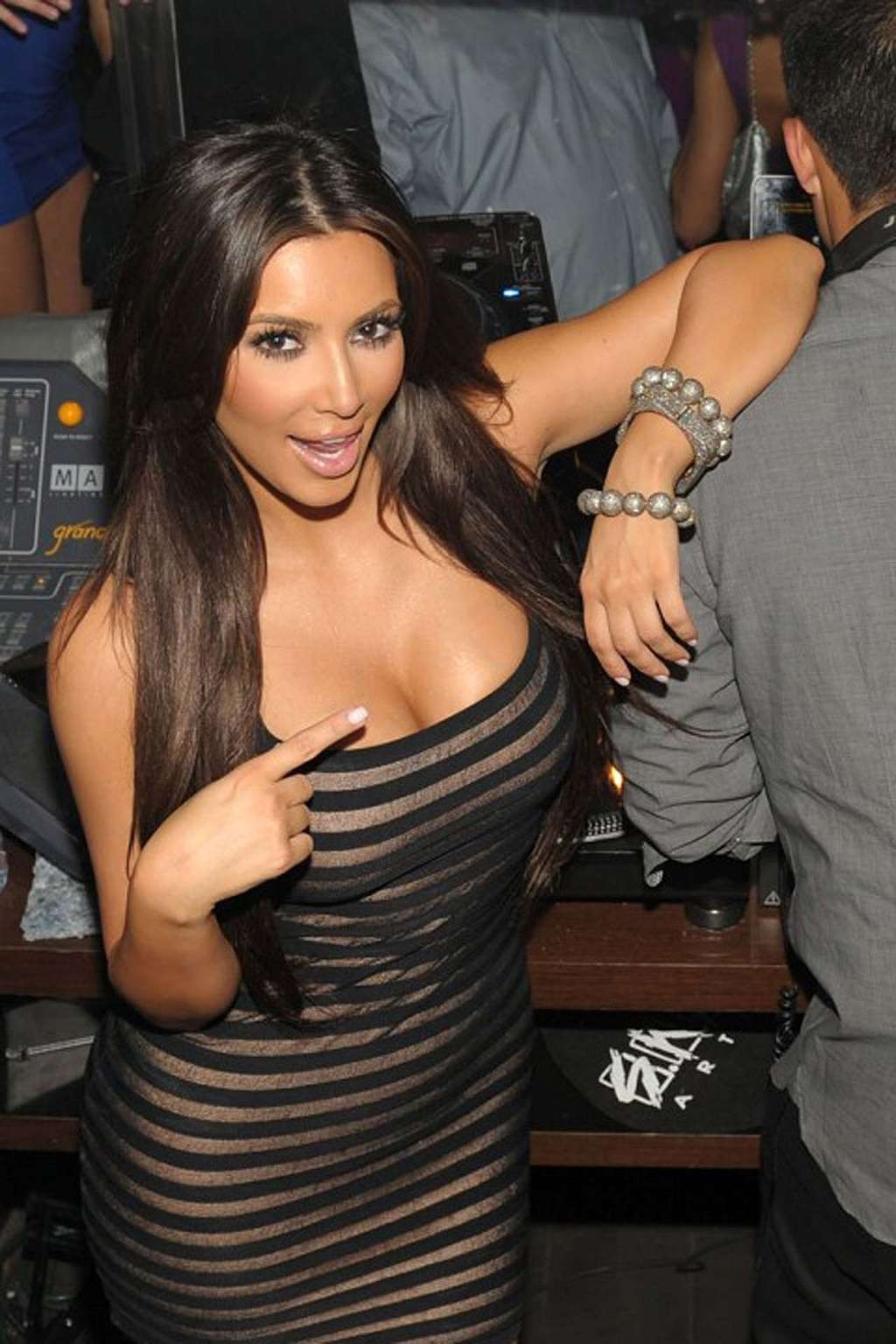 Kim Kardashian leggy in mini skirt and high boots and showing big cleavage papar #75336311