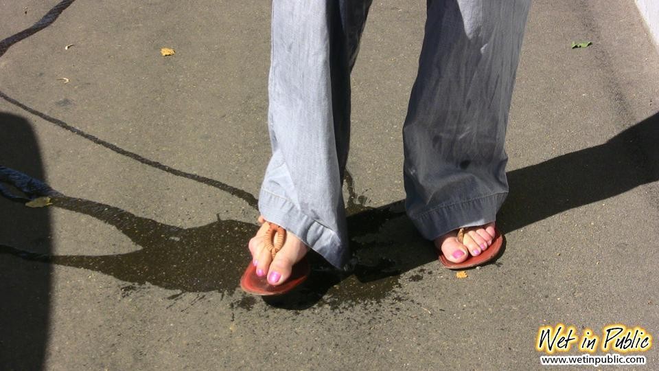 Wet outdoor gray jeans of a bunny who needed to do a pee and did it #73245425