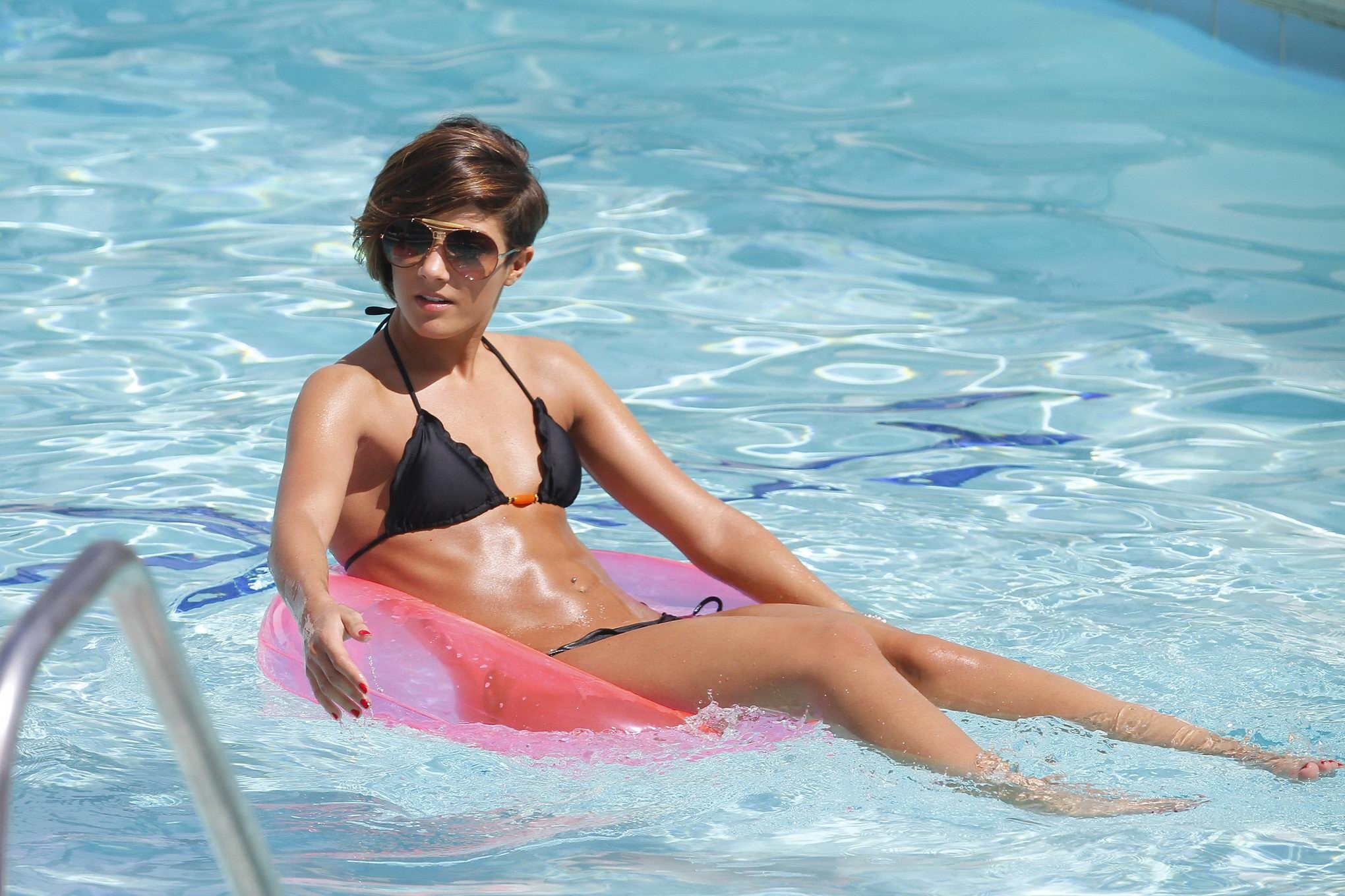 Frankie Sandford wearing sexy black bikini at the pool in LA #75309283