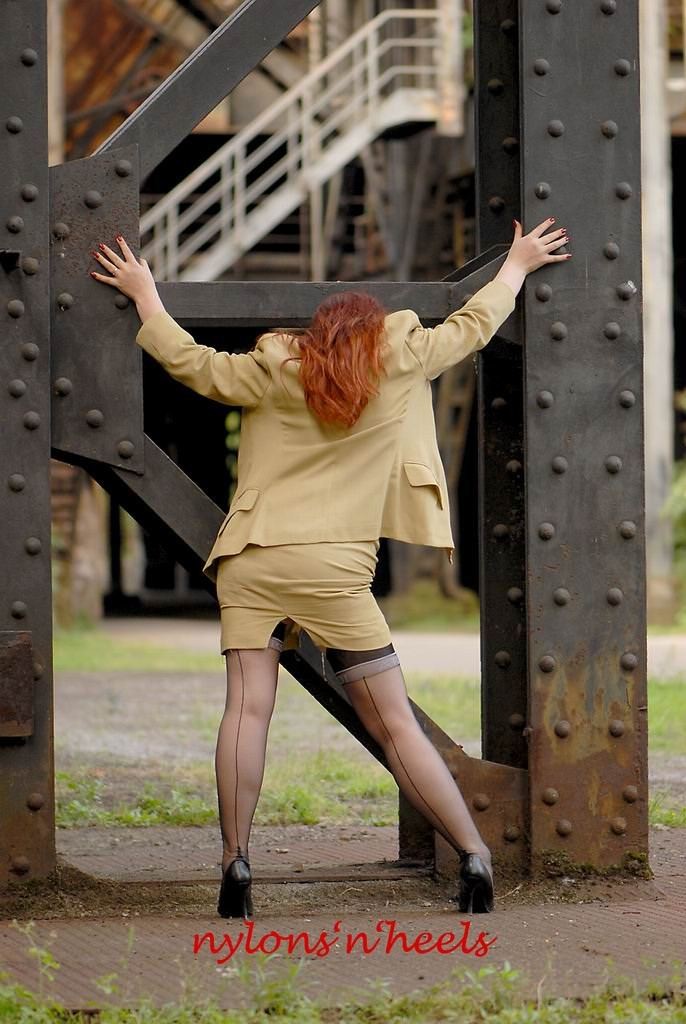 Redhead lady Justine in stockings spreading outdoors #78617391