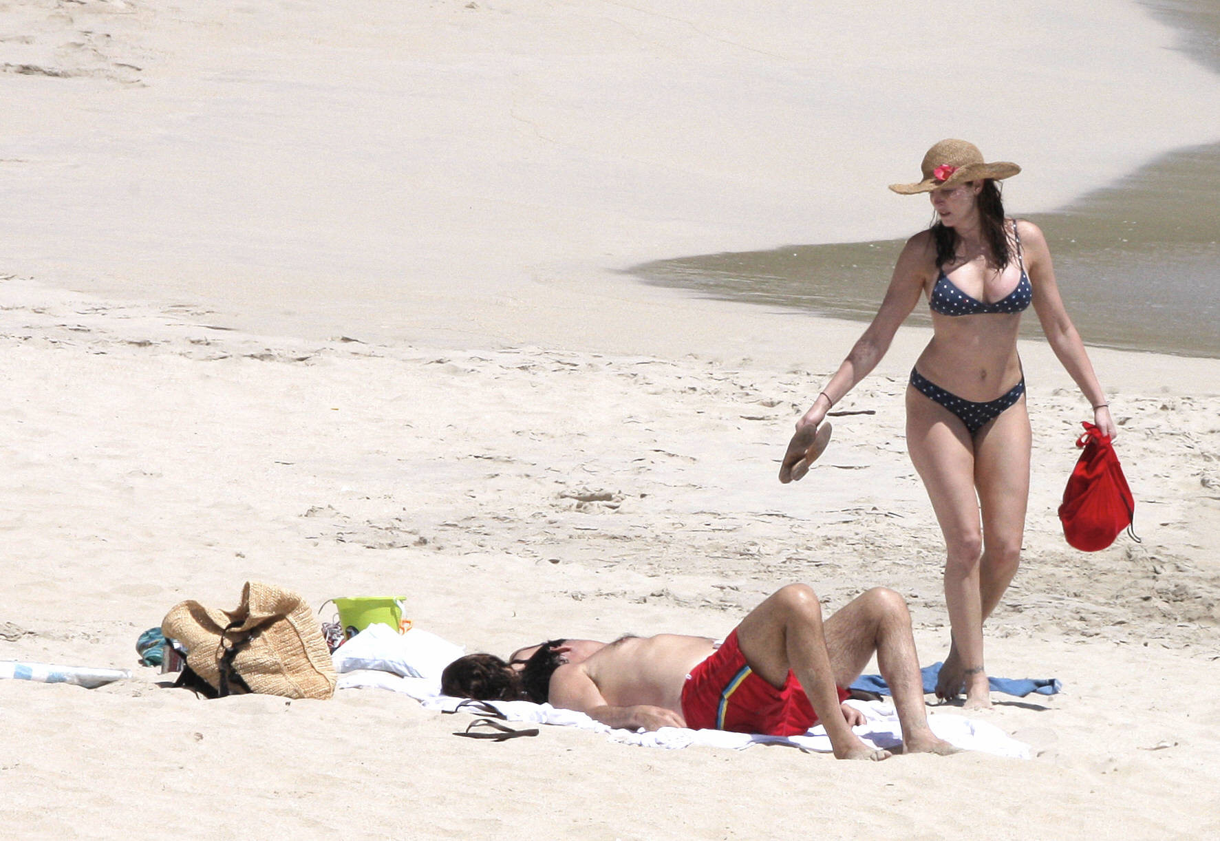 Stephanie Seymour busty wearing polka dot bikini on the beach in St. Barts #75311346
