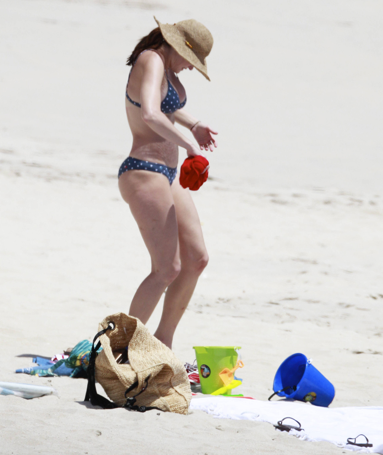 Stephanie Seymour busty wearing polka dot bikini on the beach in St. Barts #75311374