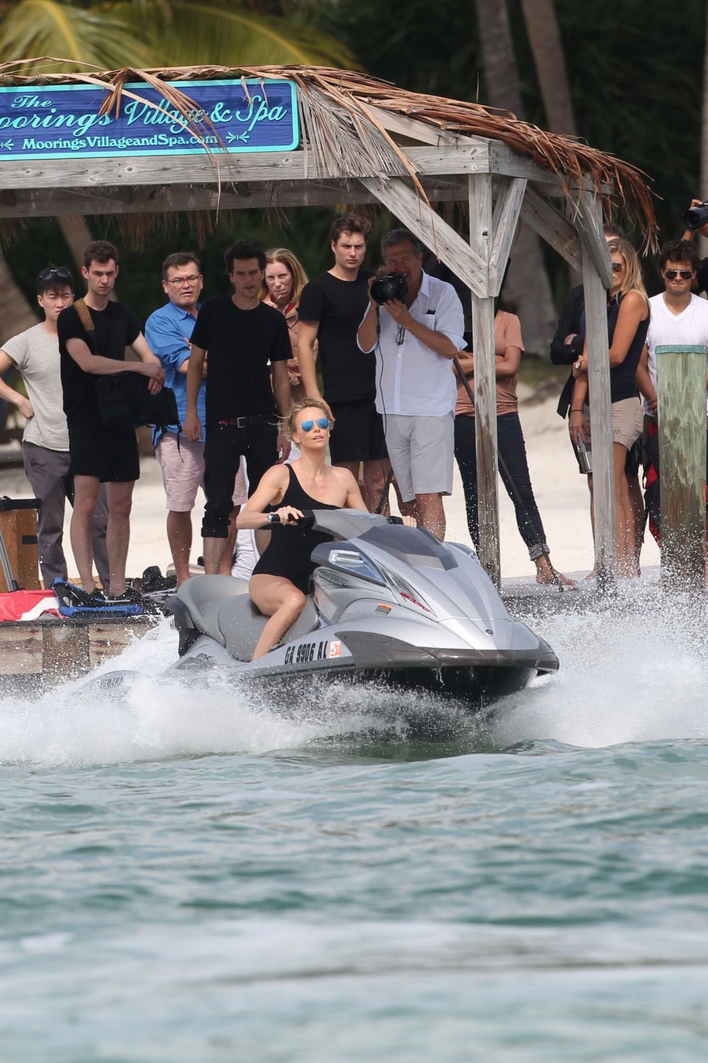 Charlize Theron jet skiing in black monokini during the photoshoot in Miami Beac #75201343